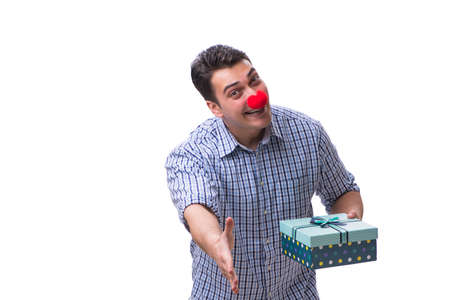 Man with a red nose funny holding a shopping bag gift present isの写真素材