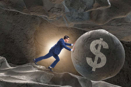 Businessman pushing dollar sign in business concept