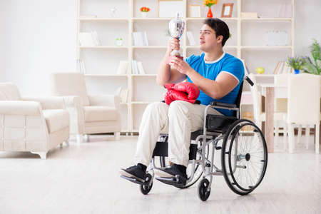 Disabled boxer at wheelchair recovering from injuryの写真素材