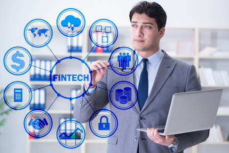 Businesswoman with laptop in financial technology fintech concepの写真素材