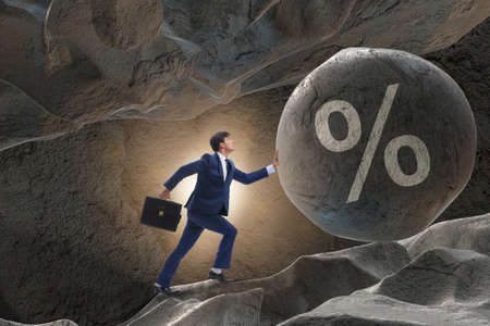 Businessman in high interest debt business concept