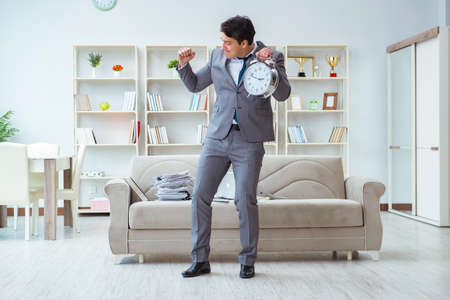 Businessman happy meeting his deadlinesの写真素材