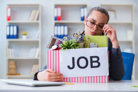 Businesswoman resigning from her jobの写真素材