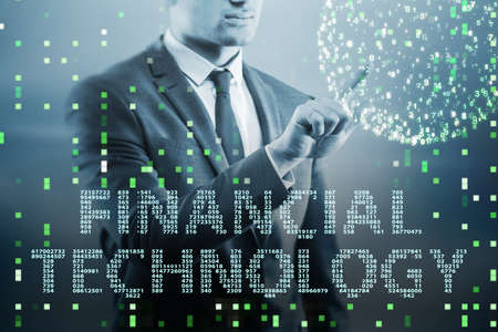 Businessman pressing buttons in fintech concept