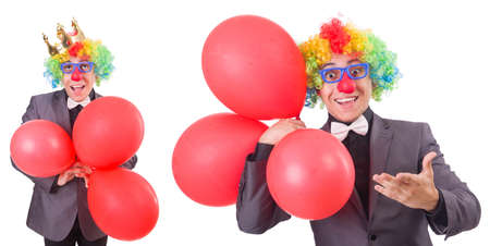 Businessman with crown isolated on whiteの写真素材