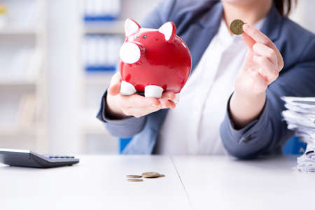 Businesswoman in pension savings conceptの写真素材