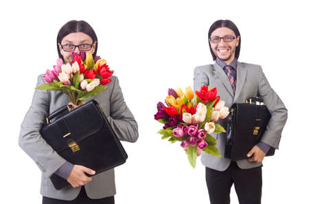 Man with flowers isolated on the whiteの写真素材