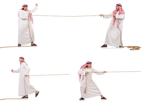 Arab in tug of war concept on whiteの写真素材