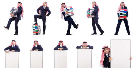 Arab businessman with many folders on whiteの写真素材