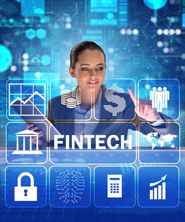 Businesswoman with tablet in financial technology fintech concepの写真素材