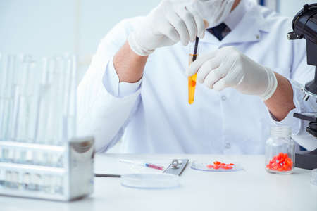 Doctor testing patients urine for medical purposes