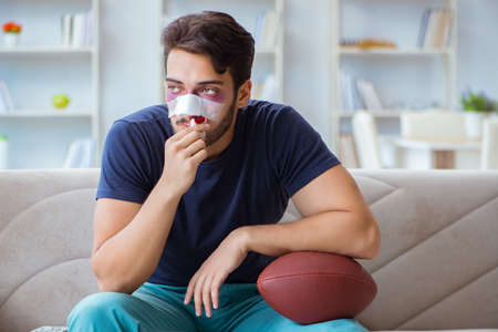Young man defeated in sports game suffered loss with broken bleeの写真素材
