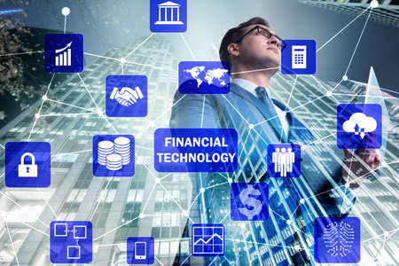 Businesswoman with laptop in financial technology fintech concepの写真素材