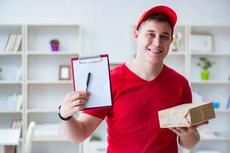 Post man delivering a parcel package