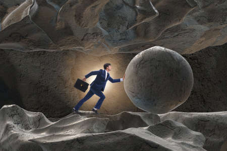 Businessman in difficult challenge conceptの写真素材