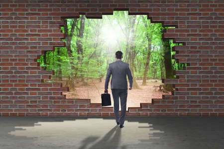 Businessman escaping for summer vacationの写真素材