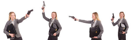 Businesswoman with gun isolated on whiteの写真素材