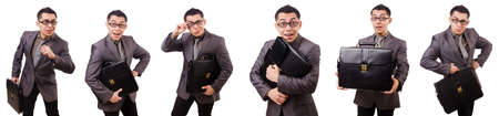 Young man holding briefcase isolated on whiteの写真素材