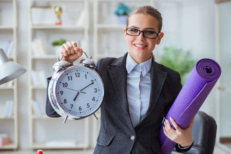 Young businesswoman in healthy lifestyle conceptの写真素材