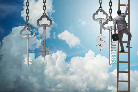 Businessman in key to financial success conceptの写真素材