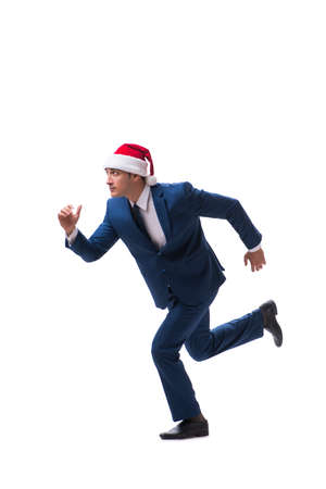 Young busnessman wearing santa hat in christmas concept on whiteの写真素材