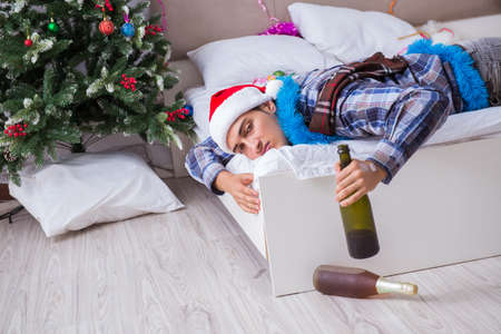 Man suffering hangover after christmas party