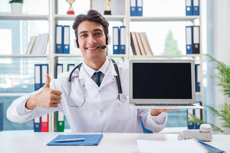 Young male doctor in telehealth concept