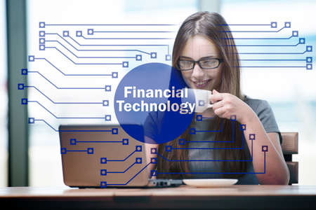 Businesswoman with computer in financial technology fintech concept