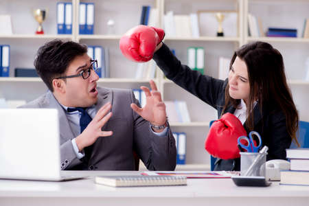 Office conflict between man and womanの写真素材