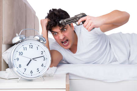 Man in bed suffering from insomniaの写真素材