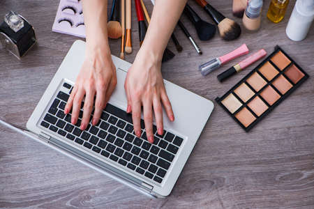 Fashion blogger with make-up accessoriesの写真素材