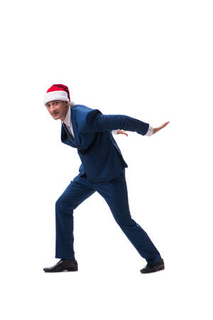 Young busnessman wearing santa hat in christmas concept on whiteの写真素材