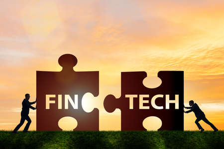 Fintech financial technology concept with puzzle pieces