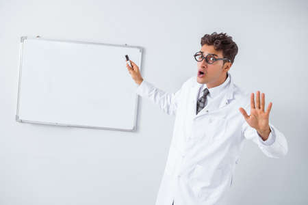 Funny doctor scientist making presentation in hospital