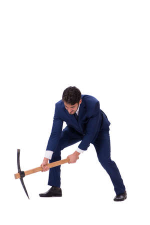 Young businessman with axe isolated on whiteの写真素材