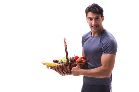 Man promoting the benefits of healthy eating and doing sportsの写真素材