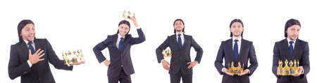 Businessman with crown isolated on whiteの写真素材