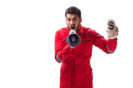 Young repairman with a megaphone and a money bag isolated on whiの写真素材