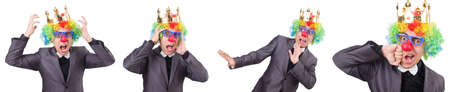 Businessman with crown isolated on whiteの写真素材