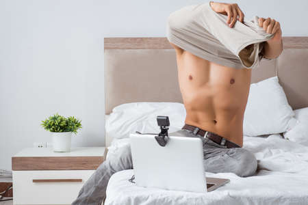 Young sexy man in online dating concept