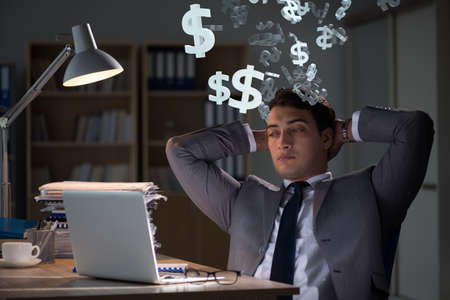 Businessman in dollar financial conceptの写真素材