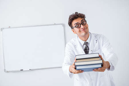 Funny doctor scientist making presentation in hospitalの写真素材