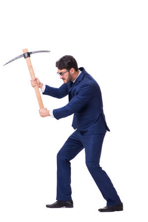 Young businessman with axe isolated on white backgroundの写真素材