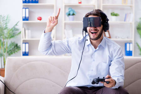 Student gamer playing games at home