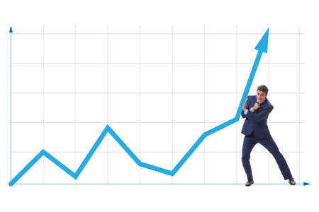 Businessman trying to help economic growth in business conceptの写真素材