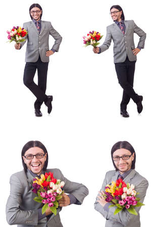 Man with flowers isolated on the whiteの写真素材