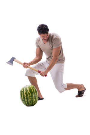 Young man with watermelon isolated on whiteの写真素材