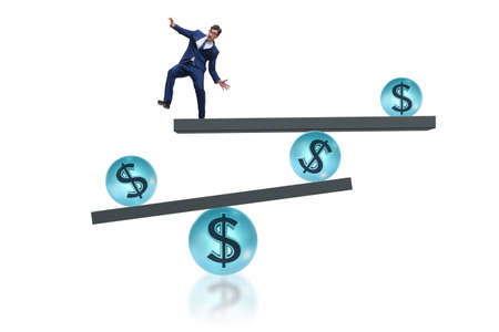 Businessman balancing in financial dollar conceptの写真素材