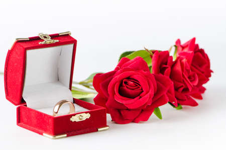 Wedding concept with rings and rosesの写真素材