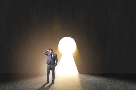 Businessman facing difficult choice dilemmaの写真素材